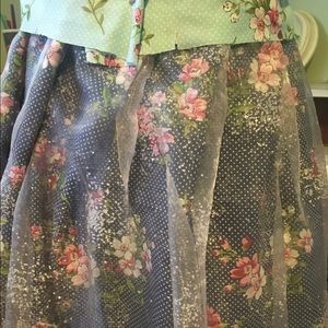 Flower skirt with black mesh on it